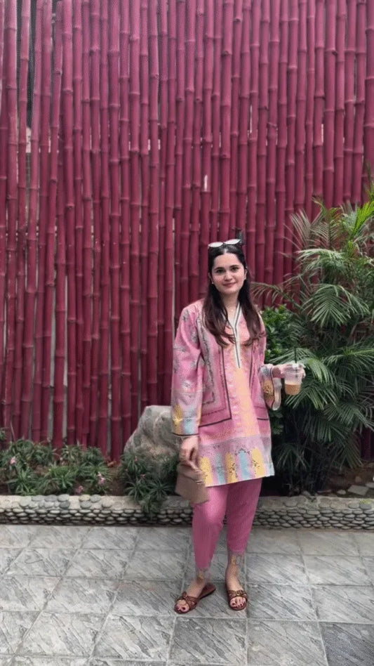 sage green or pale mint-colored kurti/dress