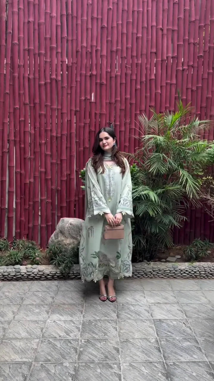 sage green or pale mint-colored kurti/dress