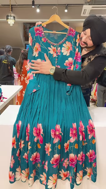 Bright Pink Floral Printed Flared Kurti with Embroidered Neckline and Button Detailing