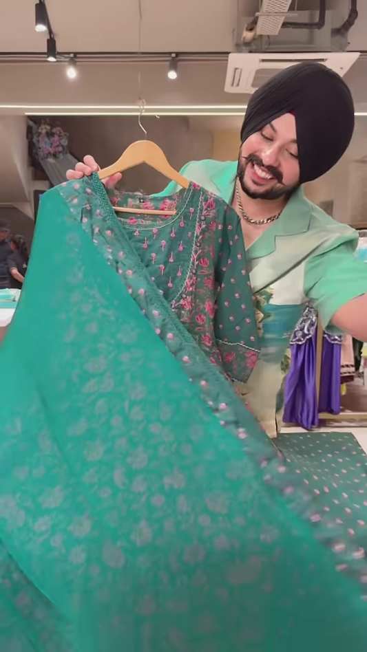 Green Floral Printed Ethnic Dress with Embroidered Neckline and Coordinated Fabric Panel