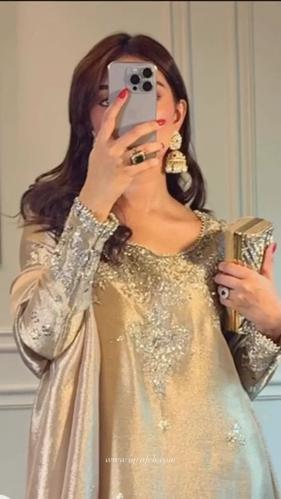 Shimmering Champagne: Intricate Silver Embellishment on Raw Silk