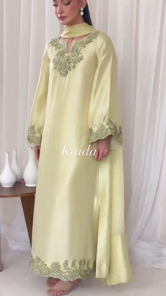 elegant, floor-length ethnic ensemble, likely a Kaftan or a long A-line Kurta/Abaya with a matching dupatta (scarf).